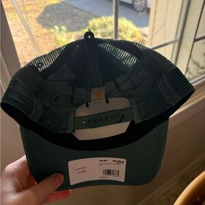 Turquoise carhartt trucker hat. Unisex one size. Never worn